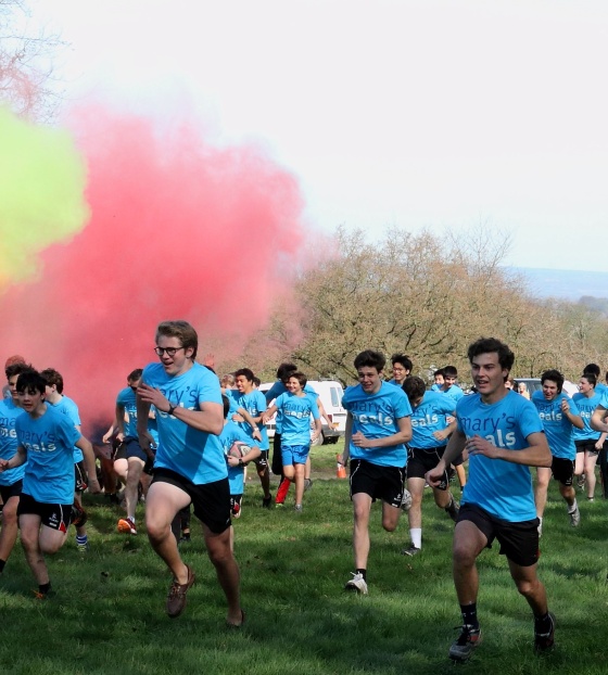 Fun run for charity with coloured flares